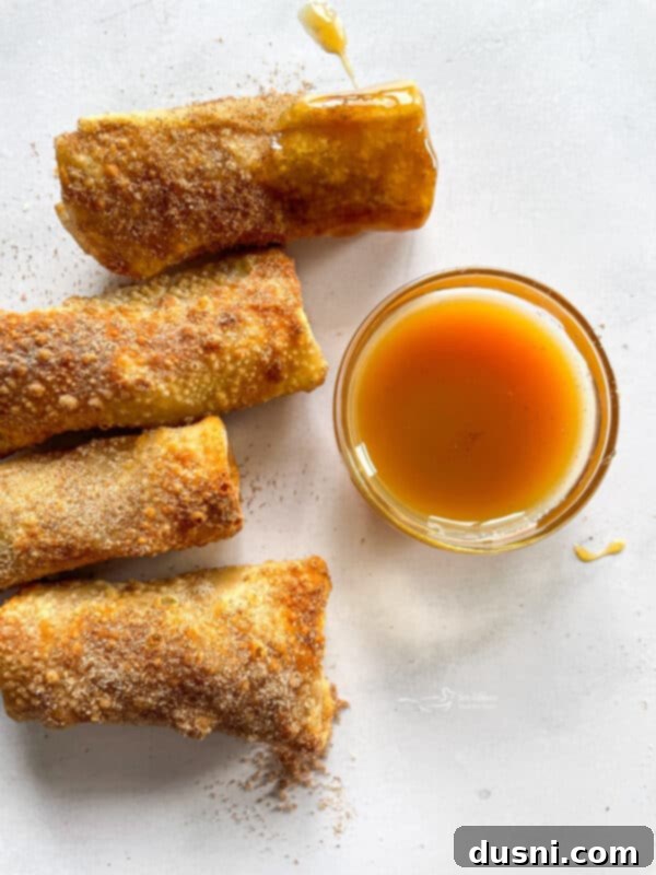 Air Fried Apple Pie Egg Rolls 10 Golden brown Air Fryer Apple Pie Egg Rolls ready to serve