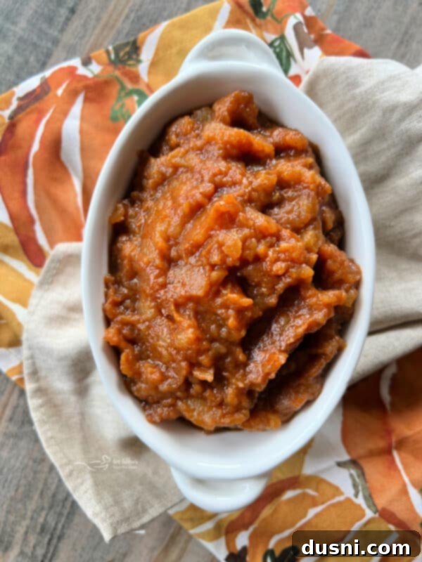 A rustic, chunky version of Instant Pot Pumpkin Applesauce in a bowl.