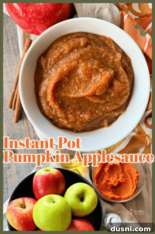 A bowl of Instant Pot Pumpkin Applesauce with a spoon, ready to be enjoyed.