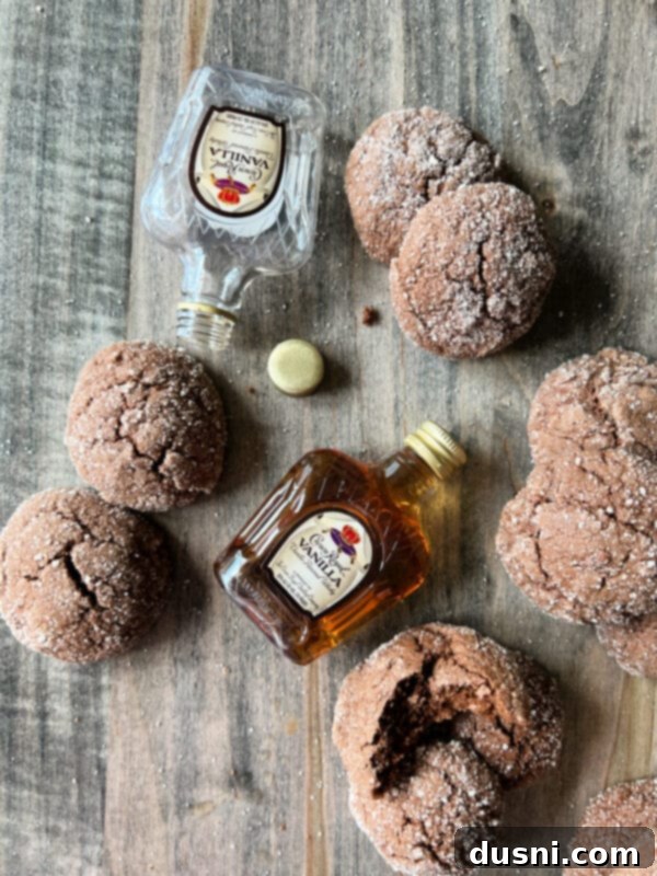 A close-up of two Vanilla Crown Royal Cookies, showcasing their soft texture and vanilla sugar coating