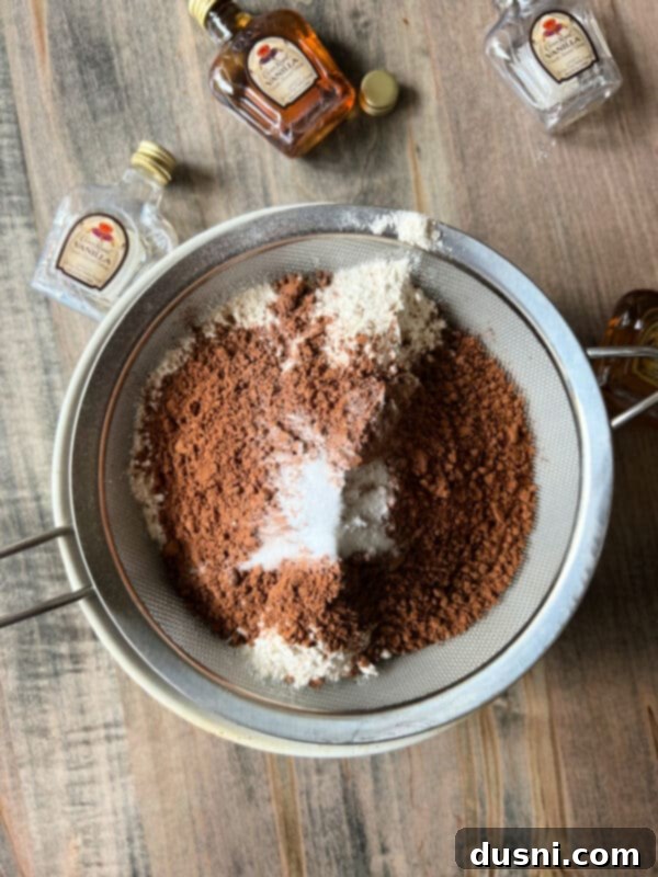 Wet ingredients for Vanilla Crown Royal Cookies being mixed