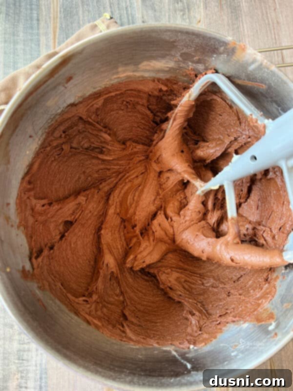 Dry ingredients added to wet ingredients for Vanilla Crown Royal Cookies