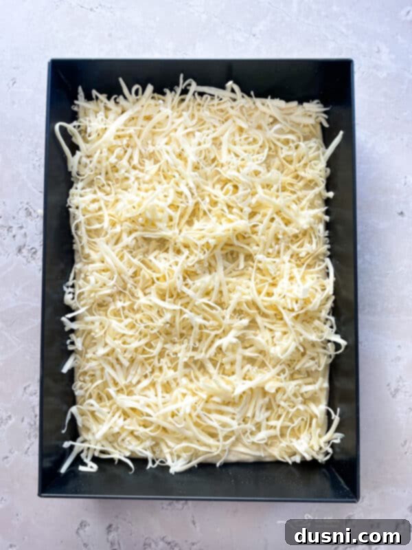 Homemade Detroit Style Pizza Perfection 12 Detroit Style Pizza dough stretched in the pan, ready for toppings.