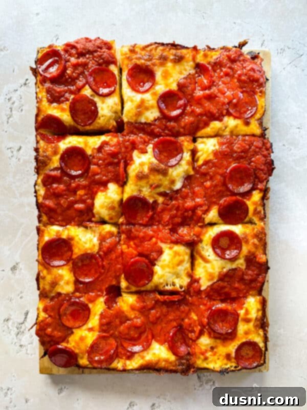 Homemade Detroit Style Pizza Perfection 15 Freshly baked Detroit Style Pizza with crispy edges.