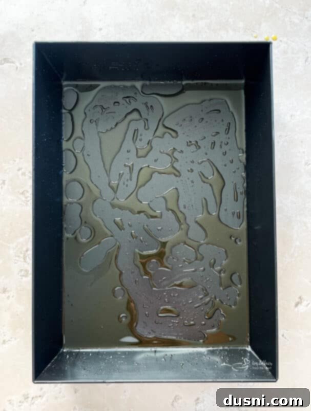 Homemade Detroit Style Pizza Perfection 9 Detroit Style Pizza dough rising in a greased bowl.