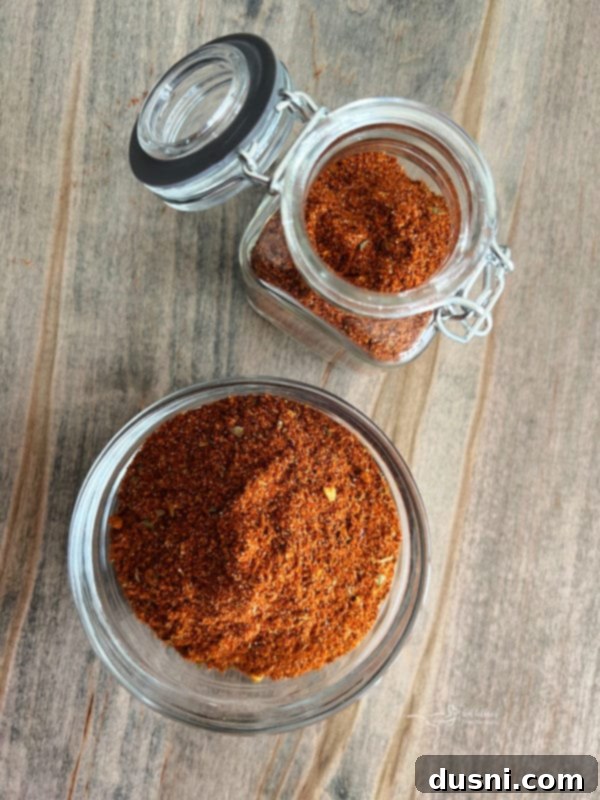homemade taco seasoning in a glass jar with a label