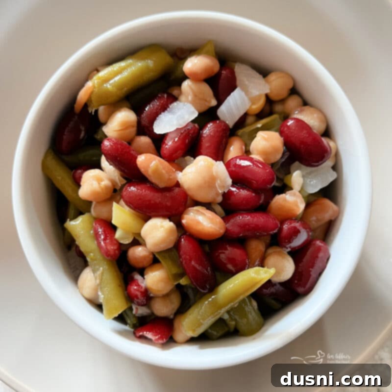 Plate with Air Fryer BBQ Chicken Tenders and Paisley Farm Five Bean Salad