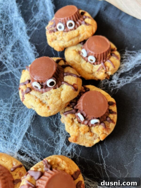 A plate full of freshly baked Reese's Peanut Butter Cup Spider Cookies