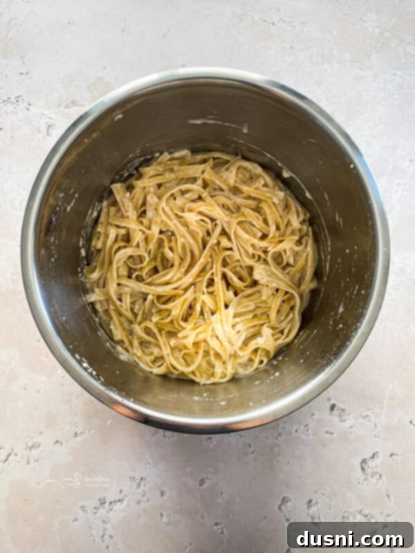 Instant Pot screen set to 6 minutes for cooking Fettuccine Alfredo.