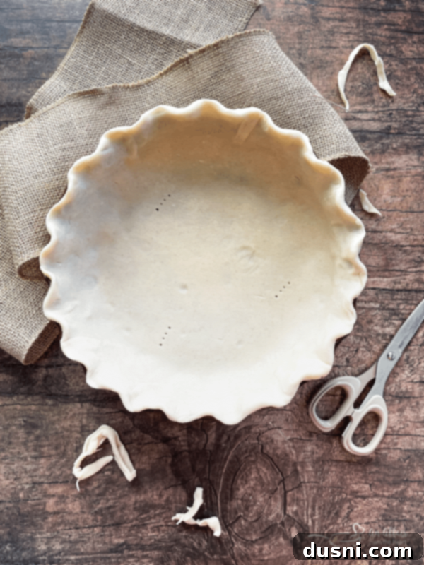 Deep-dish pie shell ready for quiche filling