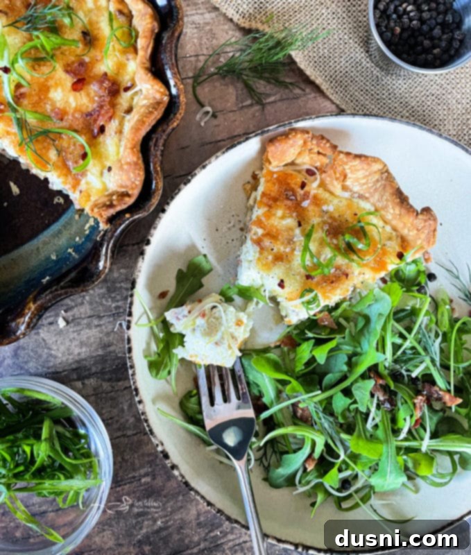 Round crustless quiche with bacon and Swiss cheese, garnished with fresh herbs