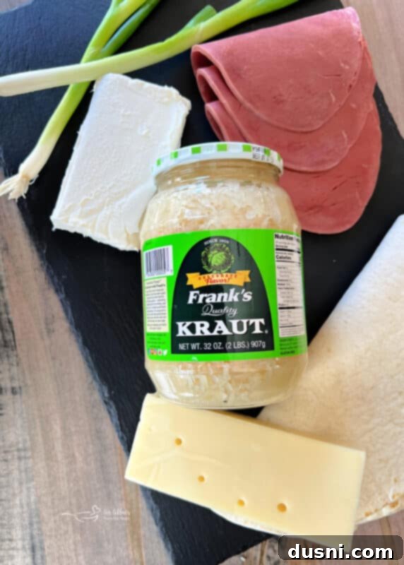 Reuben Style Tortilla Roll-Ups arranged neatly on a serving platter, showcasing their delicious filling and perfect for a party spread.