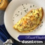 Signature Resort Omelets 2 Overhead of Omelet on a white plate with text "Resort Omelets"