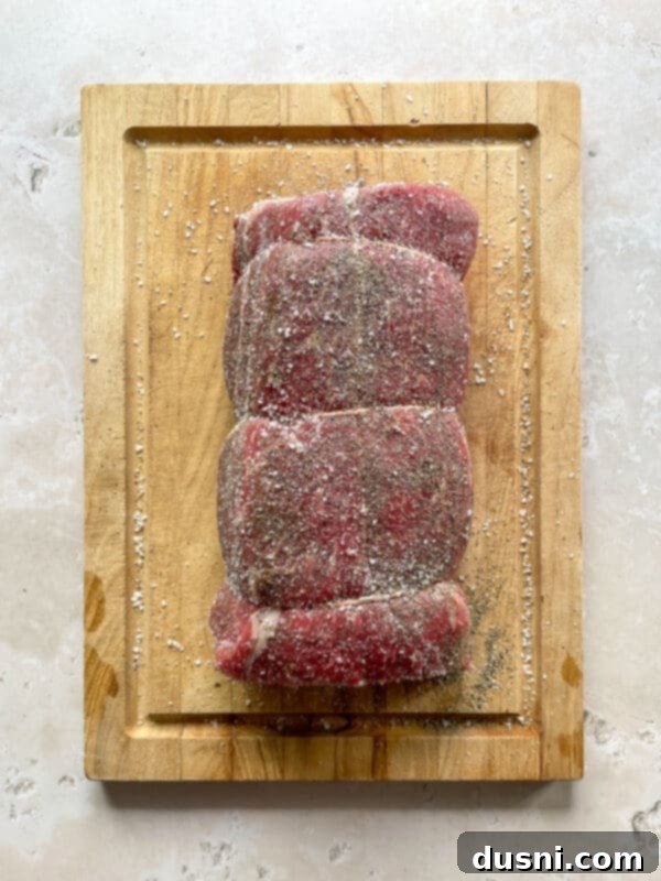 Homemade Bob Evans Style Pot Roast 8 Seasoning a tied chuck roast with salt and pepper.