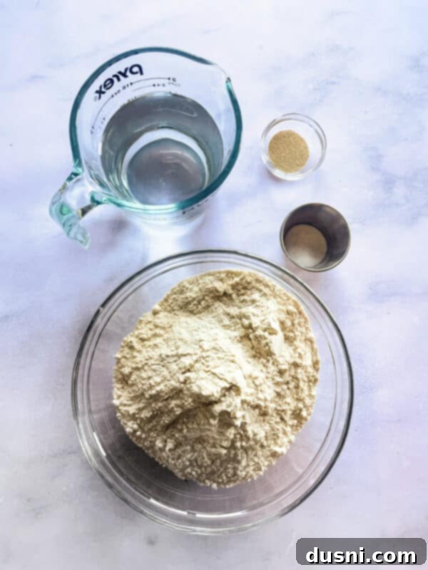 Artisan Pizza Base 3 A bowl of rising pizza dough, showcasing its expansion and aeration.