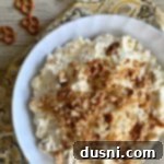 Sweet & Salty Pineapple Cloud 10 Overhead of Pineapple Pretzel Fluff in a white bowl