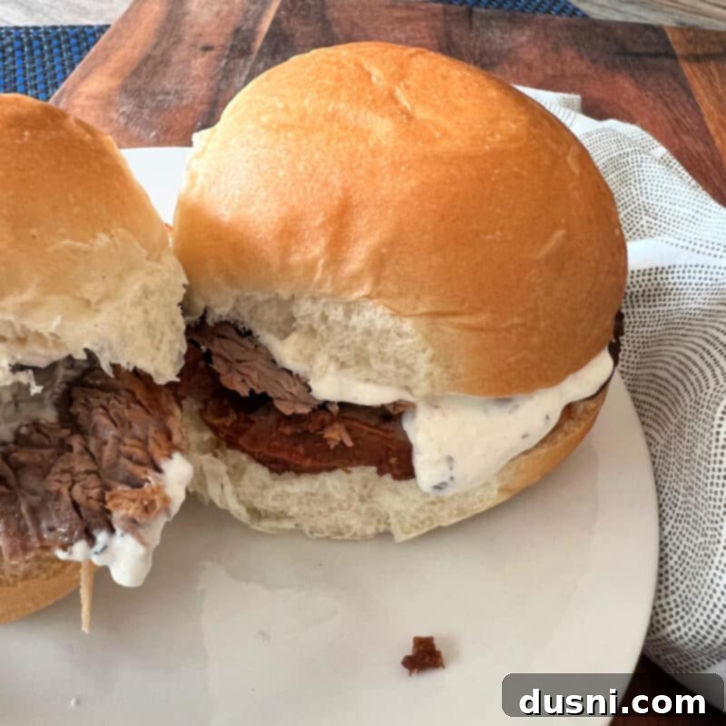 Texas Heat Smoked Brisket 15 A completed spicy beef brisket slider ready to be eaten.