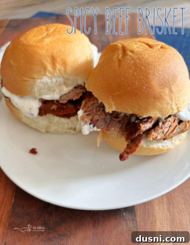 Texas Heat Smoked Brisket 17 A glorious smoked beef brisket, perfectly sliced and ready to be served, highlighting its tender texture.