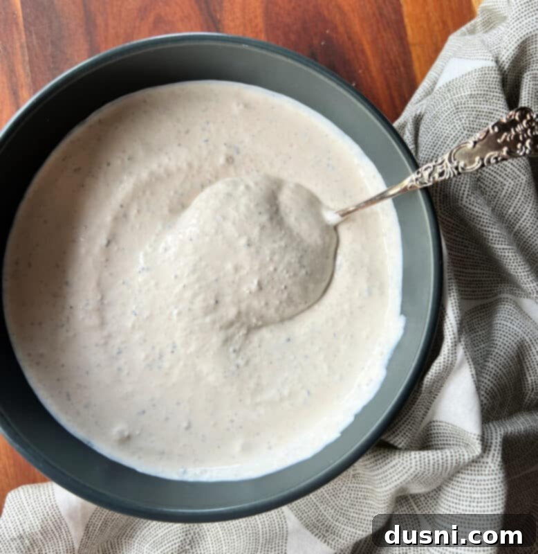 Texas Heat Smoked Brisket 9 Ingredients for homemade horseradish sauce mixed in a bowl.