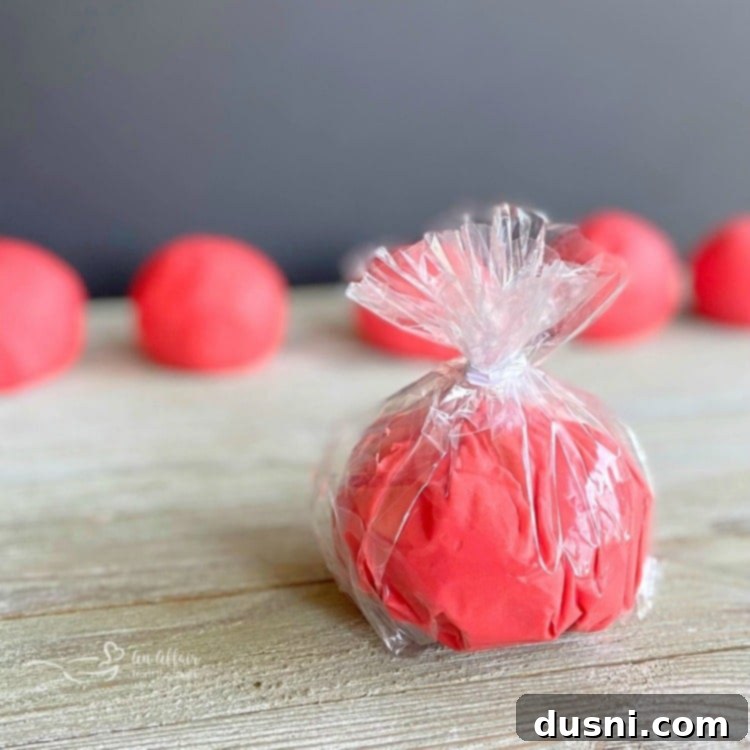 Colorful homemade playdough with Kool-Aid, ready for play