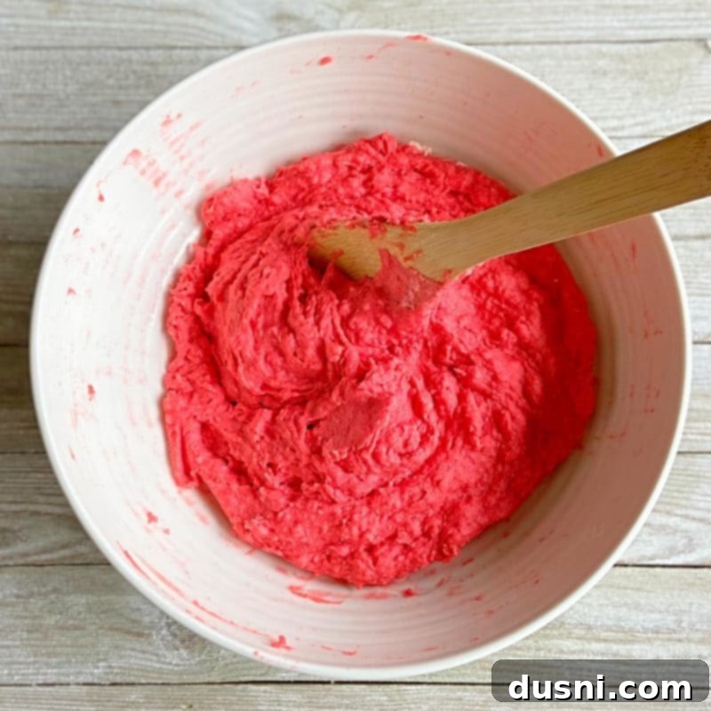 Stirring homemade playdough ingredients