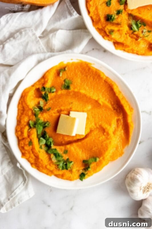 Instant Pot Buttery Mashed Sweet Potatoes topped with fresh parsley