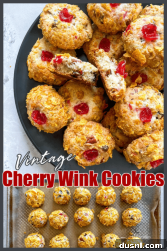 Cherry Wink Cookies on a serving platter, with some broken to show the interior.