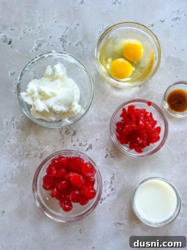 Close-up of Cherry Wink Cookies, showing the cornflake coating and a maraschino cherry.