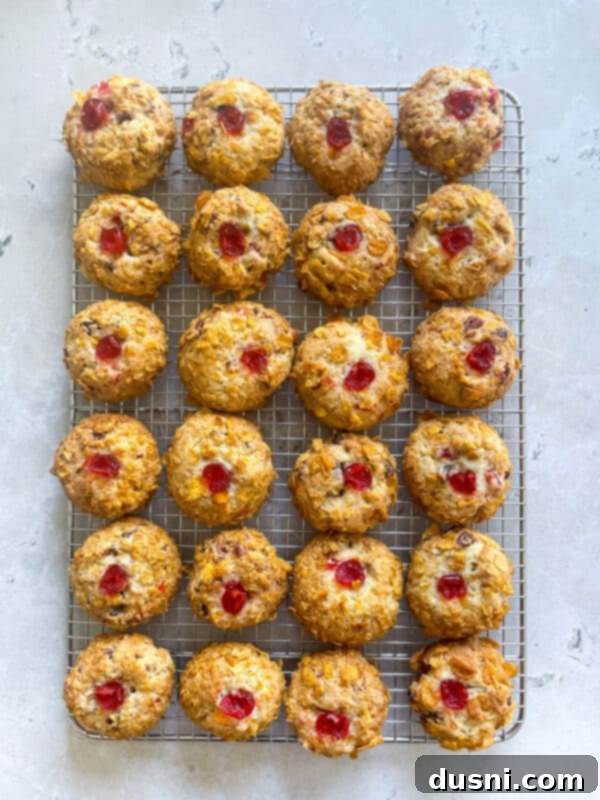 Baked Cherry Wink Cookies on a cooling rack.