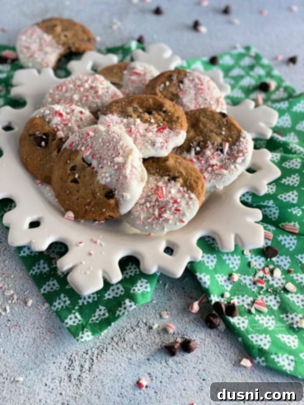 Peppermint Dipped Chocolate Chip Cookies on snowflake plate