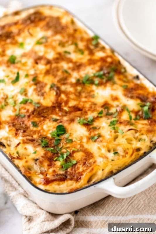 Hearty Leftover Turkey Pasta Bake 11 Turkey Pasta Bake topped with mozzarella cheese, ready to go into the oven.