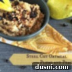 Orchard Fruit Steel Cut Oats 2 Oats in a blue bowl with text "Steel Cut Oatmeal with Plum and Pears"