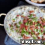 Sauerkraut, Bacon, and Swiss Dip 17 Sauerkraut, Bacon & Swiss Dip in a baking dish.