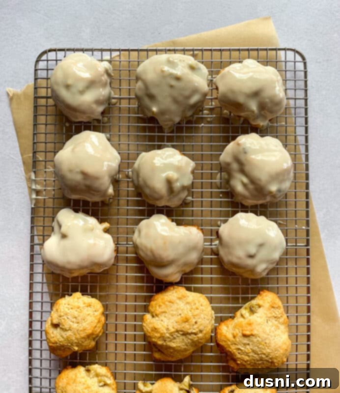 Golden Baked Banana Bites 12 Close-up of vanilla glaze in a bowl with a whisk.