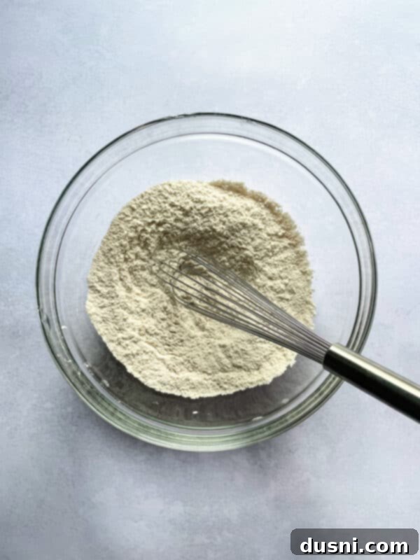 Golden Baked Banana Bites 6 Baking sheet prepared for fritters.