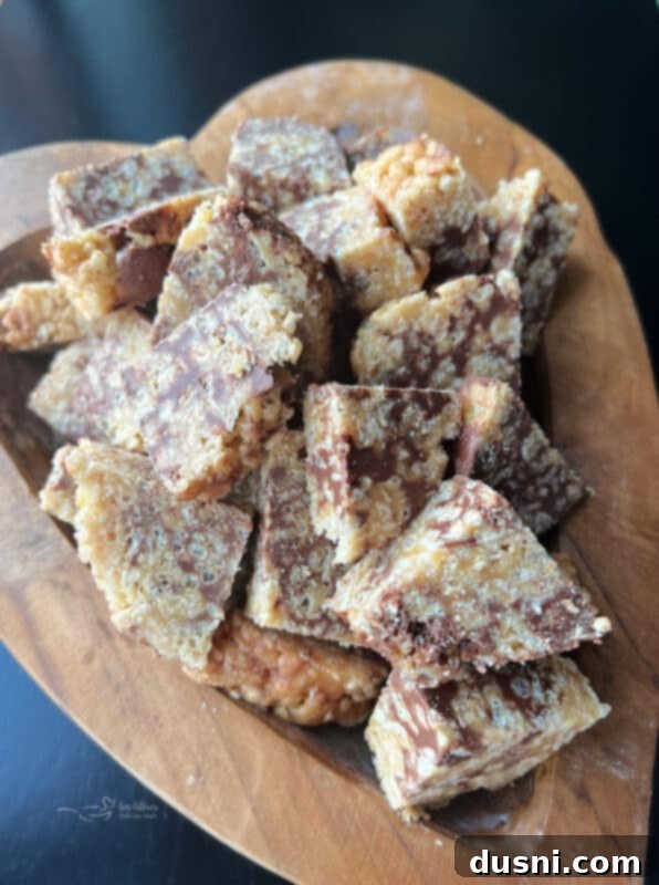 Scotcheroo Swirls 14 Close up view of the chocolate and butterscotch swirl inside a Scotcheroo Pinwheel