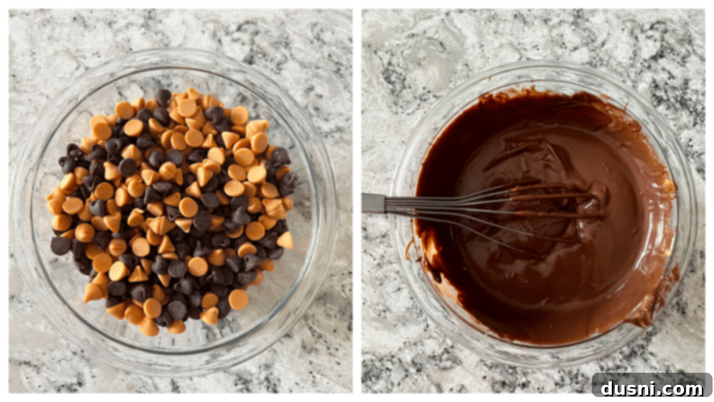 Scotcheroo Swirls 7 Crispy rice cereal being pressed into a prepared pan with buttered hands