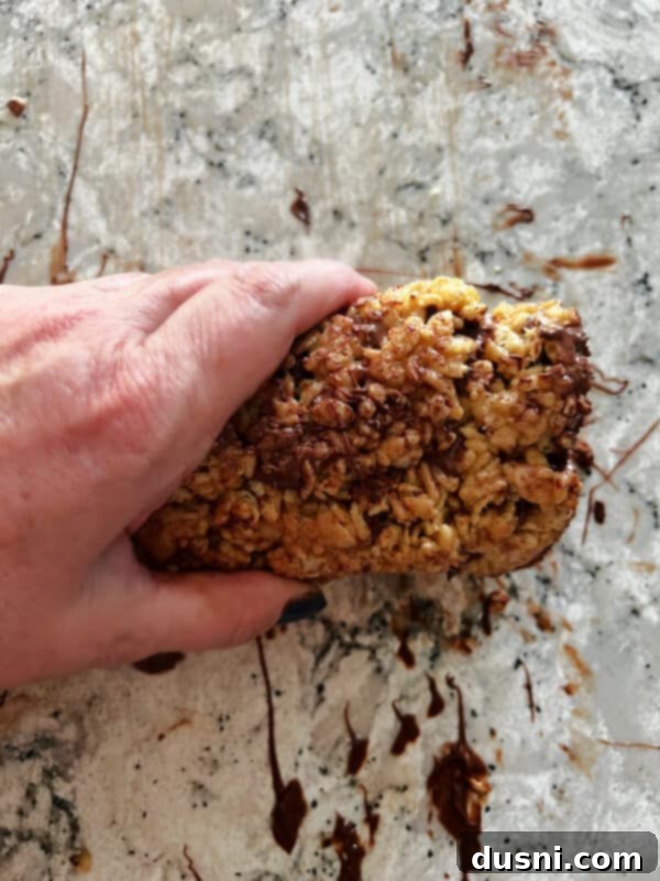 Scotcheroo Swirls 10 Scotcheroo bars with chocolate and butterscotch topping, waiting to set