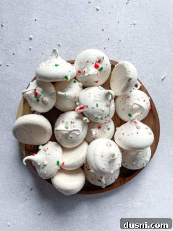 An overhead shot of peppermint meringues artfully arranged.