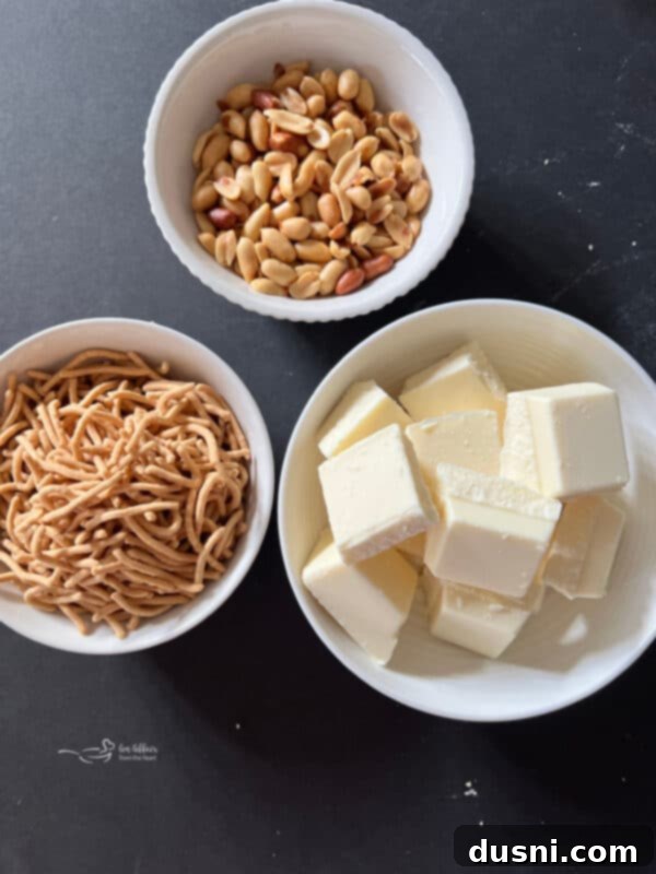 A pile of homemade White Ting A Lings on a dark surface, ready to be enjoyed.