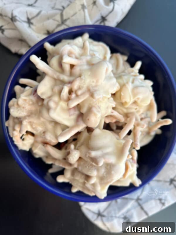 A delightful display of White Ting A Lings, some scattered and some stacked, emphasizing their homemade charm.