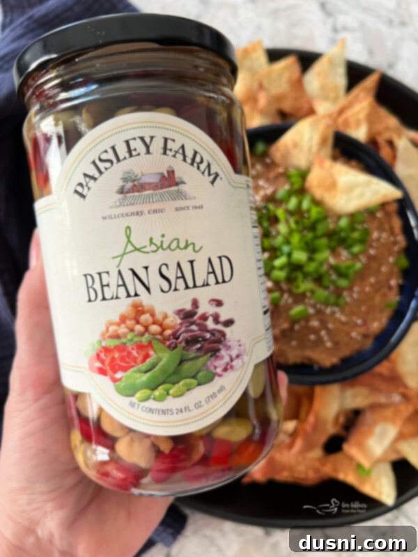 Jar of Paisley Farm Asian Bean Salad with mixed beans and vegetables