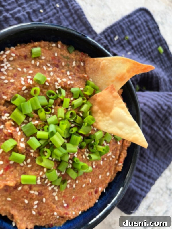 Close-up of Asian Bean Dip in a blue bowl, ready to be served