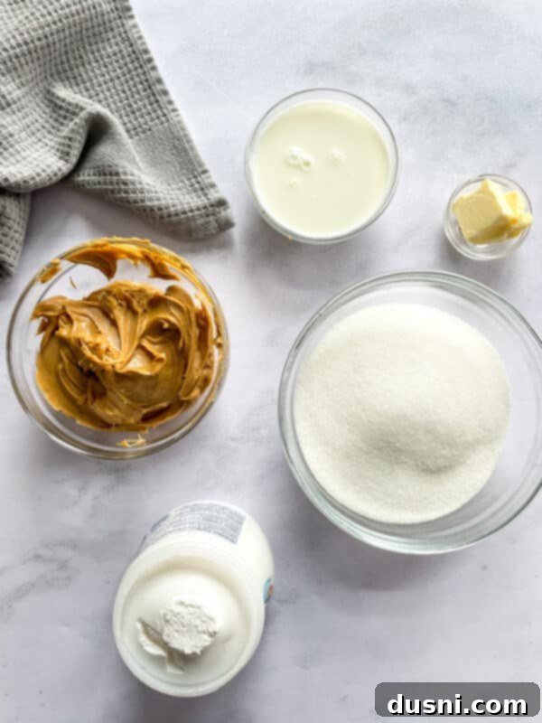 Decadent Peanut Butter Fudge 4 Freshly cut squares of peanut butter fudge.