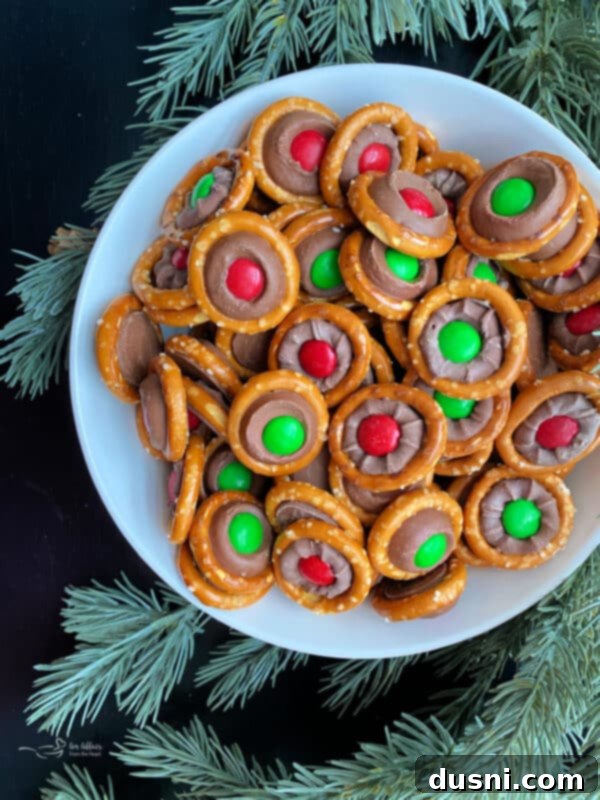 Rolo Pretzels stacked in a white bowl with a festive background