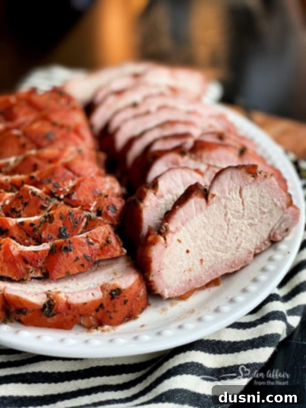 2022's Culinary Highlights: Our Top 10 Recipes 9 Smoked Pork Loin on platter with a beautiful smoke ring