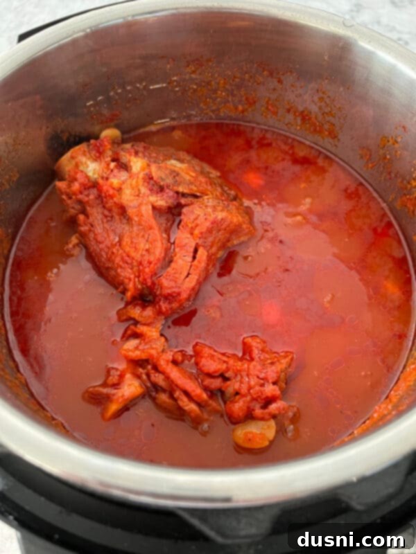 Instant Pot Grandmas Comforting Ham and Bean Soup 12 Instant Pot showing the ingredients for Ham and Bean Soup before cooking