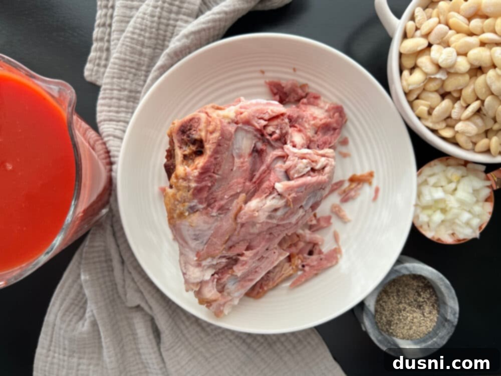 Instant Pot Grandmas Comforting Ham and Bean Soup 5 Overhead shot of Instant Pot Ham and Bean Soup ingredients laid out