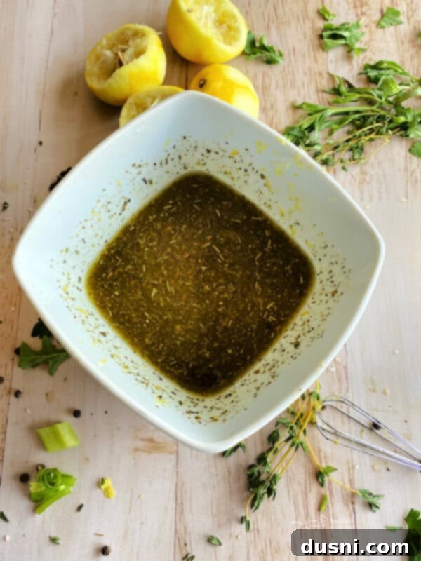 A small bowl of lemon herb dressing for the Mediterranean Celery Salad.