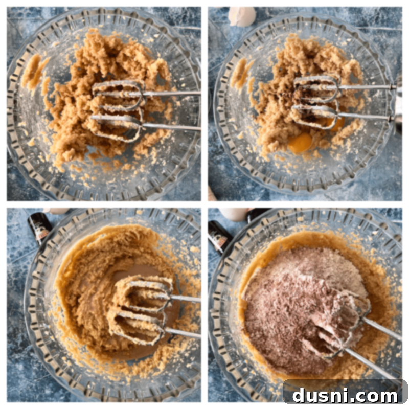 Mixing vanilla and eggs into the creamed butter and sugar mixture.